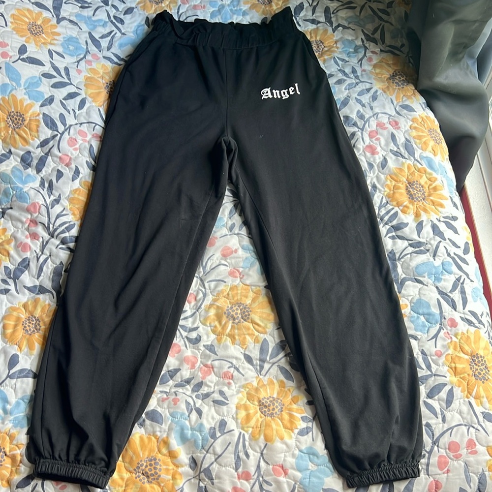 Women’s black “angel” sweatpants. Size XS/2.